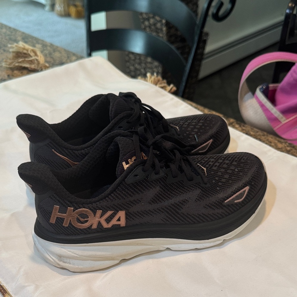 Hoka Black and Pink Athletic Shoes